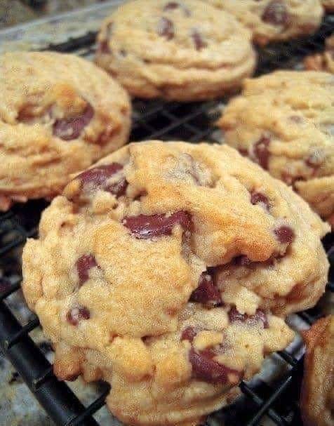 A batch of healthy no-sugar, no-flour cookies with oats, bananas, and dark chocolate chunks.